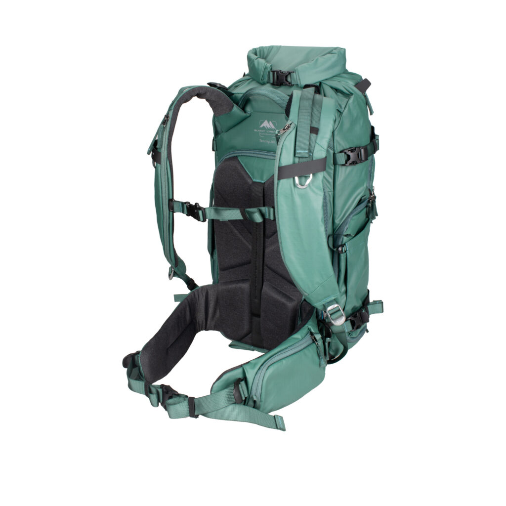 Summit-Creative Tenzing Rolltop Backpack recht zijaanzicht met EVA-rugdeel en heupriem bevestigd