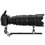 Leofoto VR-250 Lensvoet zijaanzicht van telelens en camera ondersteund door VR-250 KIT op statief voor extra stabiliteit.