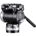 Leofoto BV-30M Videokop gemonteerd op statief met zware telelens tijdens gebruik in groene natuur.