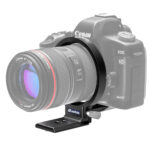 Leofoto UL-03 Objectiefvoet gemonteerd rond een telelens op een DSLR, waarbij de cameracombinatie op de Arca-Swiss voet staat.