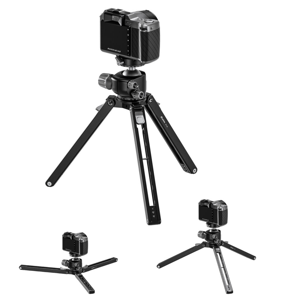 Leofoto DY‑40 statiefvoet omgebouwd tot laag tafelstatief met monopod en camera en extra ministatieven ernaast.