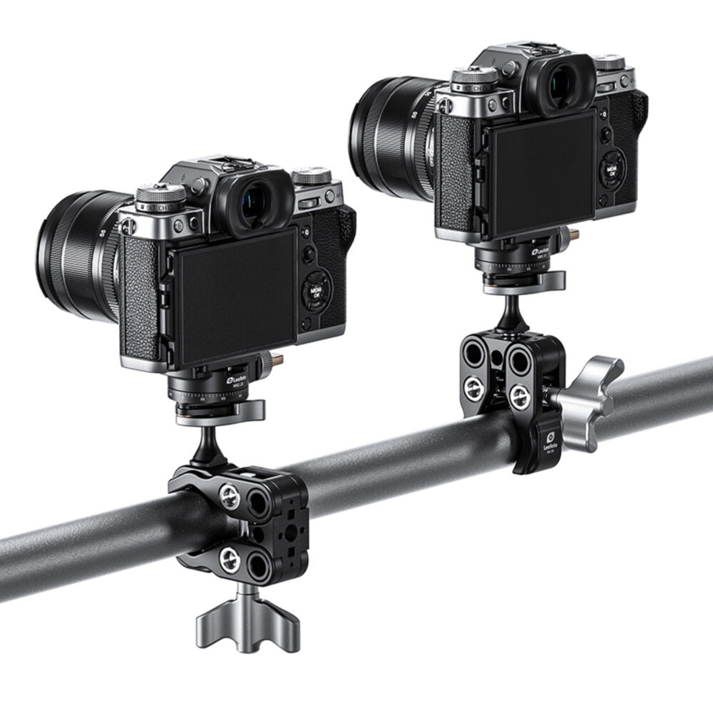 Leofoto MC-60 klem gemonteerd op ronde buis met magic arm en systeemcamera voor flexibele montage.