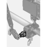 Leofoto AM‑8‑12 scharnierende arm gemonteerd aan buisklem als verbinding naar accessoire op rig.