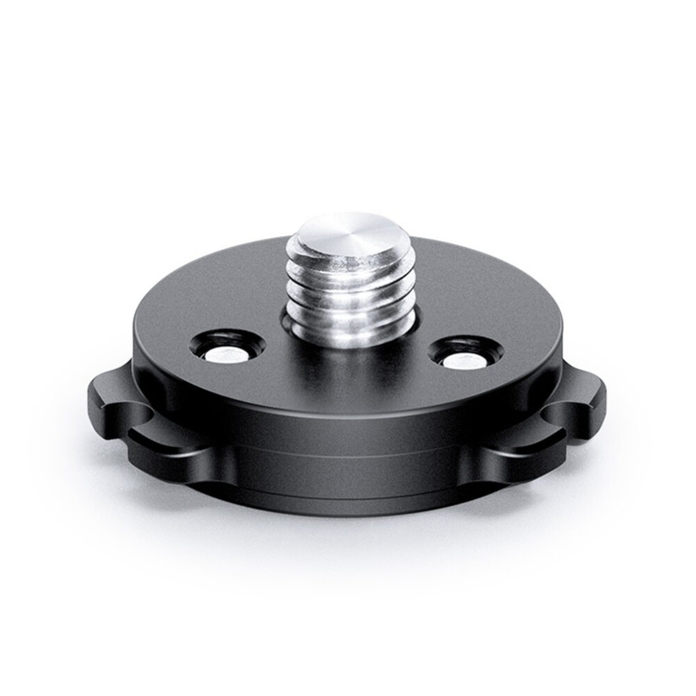 Leofoto Q45 snelwisselplaat close-up van zwarte ronde quick-link plaat met 3/8-inch statiefschroef.