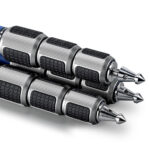 Leofoto LP-284C Tripod detailopname van drie statiefpoten met spikes en robuuste Poseidon-draaisluitingen.